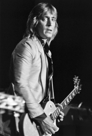 portrait, Mick Ronson (in Mott the Hoople) at The Rainbow, Denver, Colorado, July 1979